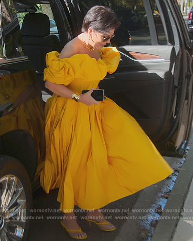 Kris’s yellow ruffle off shoulder dress on The Kardashians
