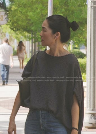 Laurel’s dark grey draped top on The Summer I Turned Pretty