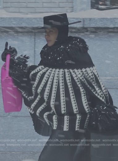 Lisa’s black fringe cape on And Just Like That