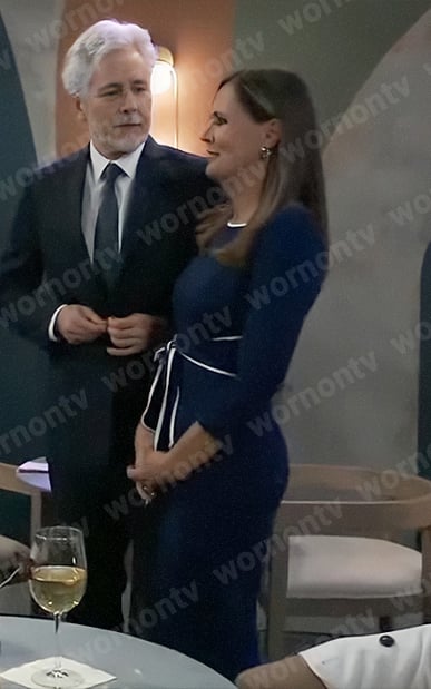 Lucy’s navy tie waist dress with white trim on General Hospital