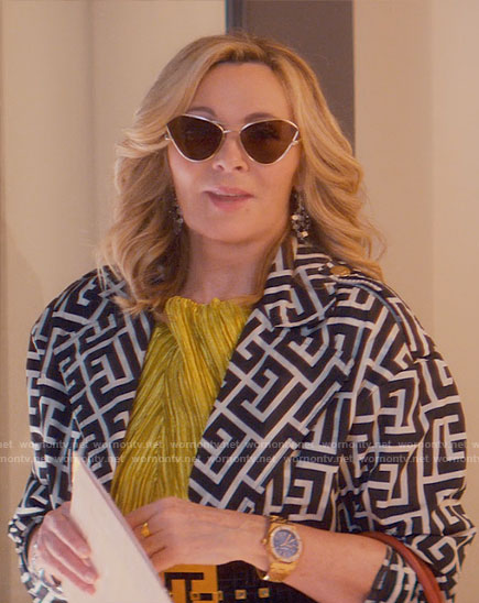 Madolyn’s monogram print coat and pants on Glamorous