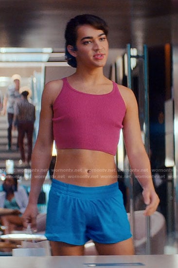 Marco’s pink platform sneakers, blue shorts and pink crop top on Glamorous