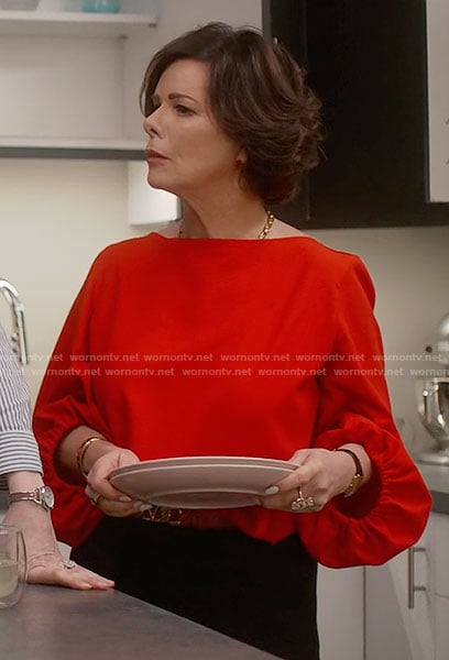 Margaret’s red balloon sleeve blouse on So Help Me Todd