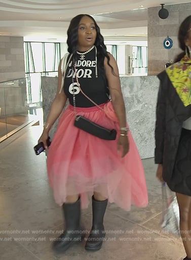 Marlos’s black printed top and bag on The Real Housewives of Atlanta