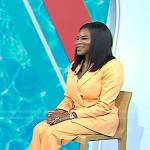 Dr. Michelle Henry’s orange suit and pink mules on Today
