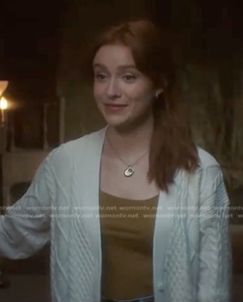 Nancy’s white cable knit cardigan on Nancy Drew