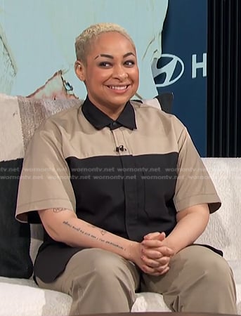 Raven Symone’s beige and black colorblock shirt on E! News