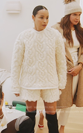 Sai’s white cable knit sweater on The Real Housewives of New York City