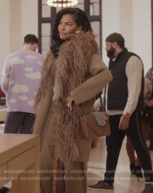Seema’s brown leather bag on And Just Like That