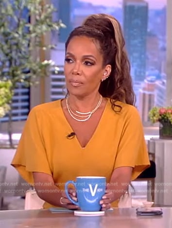 Sunny’s yellow v-neck midi dress on The View