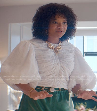 Venetia’s white ruched top and green leather shorts on Glamorous