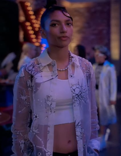 Zaara’s white floral sheer blouse on Grown-ish