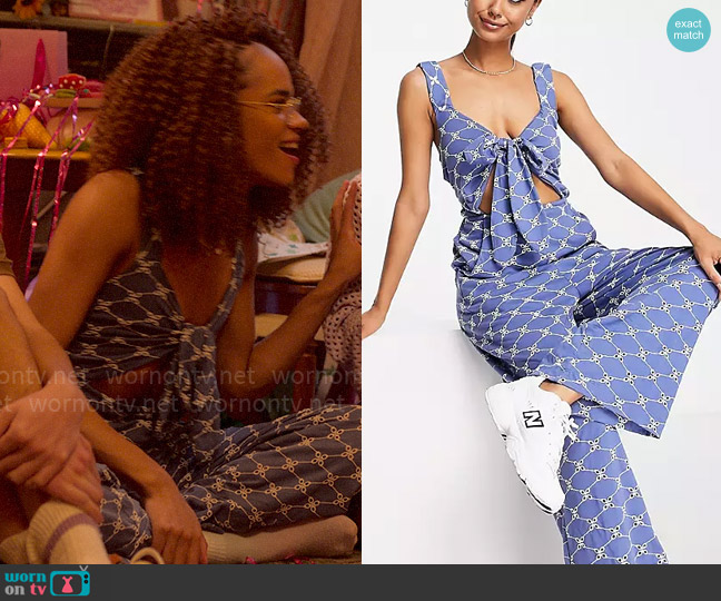 ASOS Design Jersey eyelet elasticated back jumpsuit in blue worn by Elle Argent (Yasmin Finney) on Heartstopper