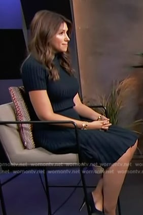 Camille Vasquez’s navy short sleeve top and skirt on Access Hollywood