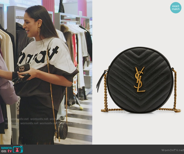 Saint Laurent Vinyle Round Quilted Leather Camera Bag worn by Jessel Taank on The Real Housewives of New York City