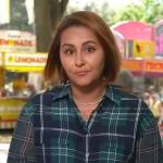 Ali’s green plaid button down shirt on NBC News