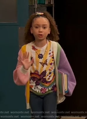 Alice’s butterfly graphic tee and stripe cardigan on Ravens Home
