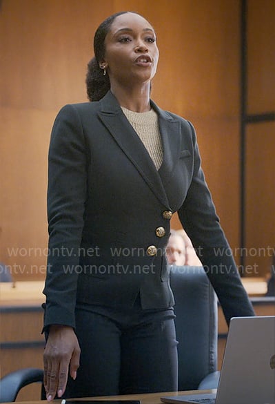 Andrea’s black asymmetric blazer with gold buttons on The Lincoln Lawyer