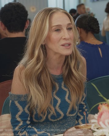 Carrie’s blue printed top and arm warmers on And Just Like That