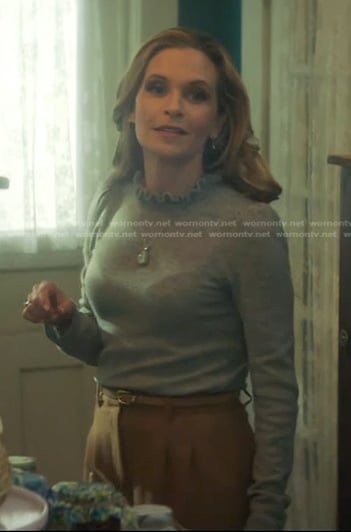 Callie’s grey ruffle neck sweater on Nancy Drew