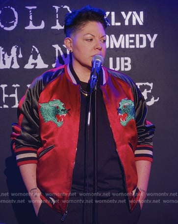 Che’s red embroidered bomber jacket on And Just Like That