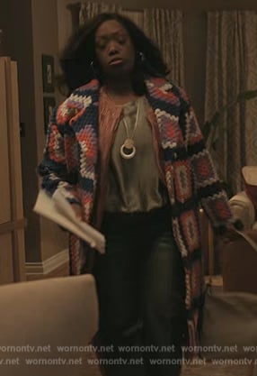 Deja’s crochet knit cardigan on The Chi