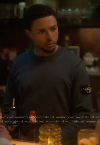 Doug’s navy patch sleeve sweatshirt on Grown-ish