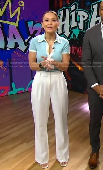 Eva’s light blue polo top and white pants on Good Morning America