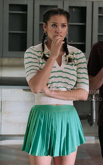 Gina’s green knit top and pleated mini skirt on High School Musical The Musical The Series