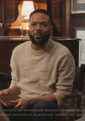 Jonathan’s white checkered sweater on Only Murders in the Building