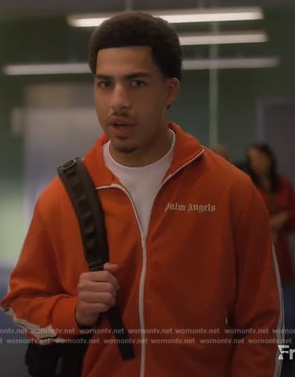 Junior’s orange track jacket and pants on Grown-ish