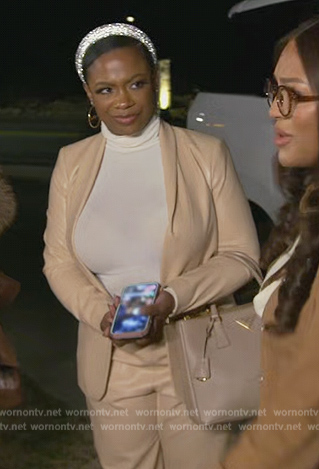 Kandi’s beige leather blazer and jogger pants on The Real Housewives of Atlanta