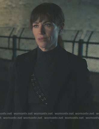 Wendy’s black hook and eye sweater on Billions