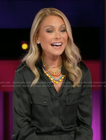 Kelly’s black satin button down jumpsuit on Generation Gap