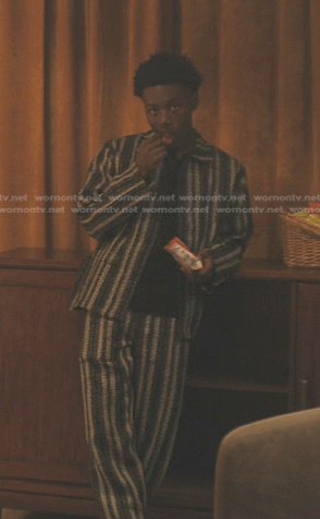 Kevin’s black striped jacket and pants on The Chi