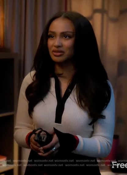 Kiela’s white contrast polo sweater on Grown-ish