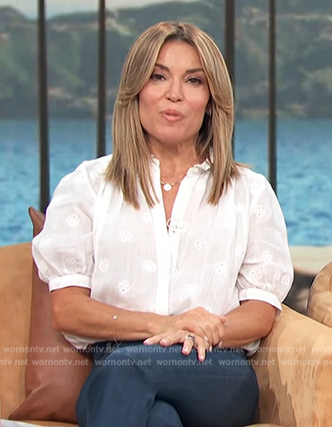 Kit’s white embroidered short sleeve top on Access Hollywood