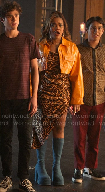 Kourtney’s leopard print asymmetric dress and cropped orange leather jacket on High School Musical The Musical The Series