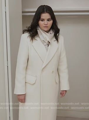 Mabel’s white long coat on Only Murders in the Building