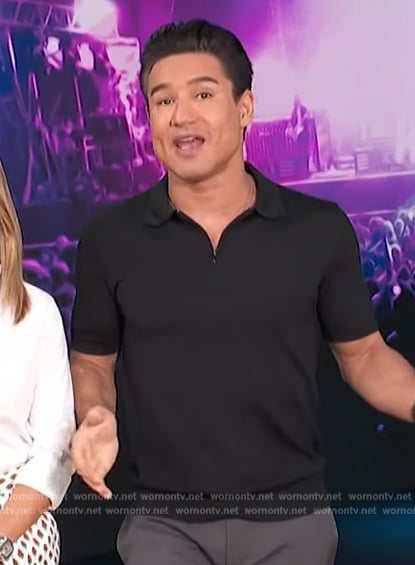 Mario’s black polo shirt on Access Hollywood
