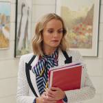 Miss Jenn’s white polka dot blazer and striped tie-neck blouse on High School Musical The Musical The Series
