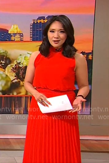 Nancy Chen’s red pleated sleeveless dress on CBS Mornings