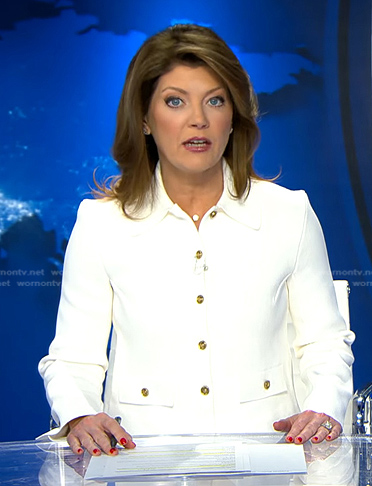 Norah’s white button jacket on CBS Evening News