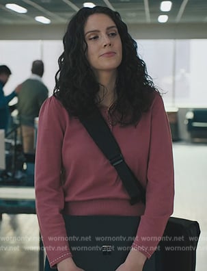 Rian’s pink contrast stitch sweater on Billions