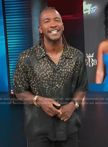Scott’s black floral print shirt on Access Hollywood