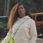 Sheree’s white logo hoodie and neon bag on The Real Housewives of Atlanta