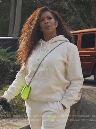 Sheree’s white logo hoodie and neon bag on The Real Housewives of Atlanta