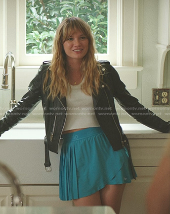 Taylor’s black moto jacket with silver buttons on The Summer I Turned Pretty