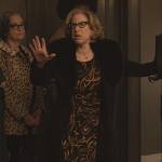Uma’s black abstract print dress on Only Murders in the Building