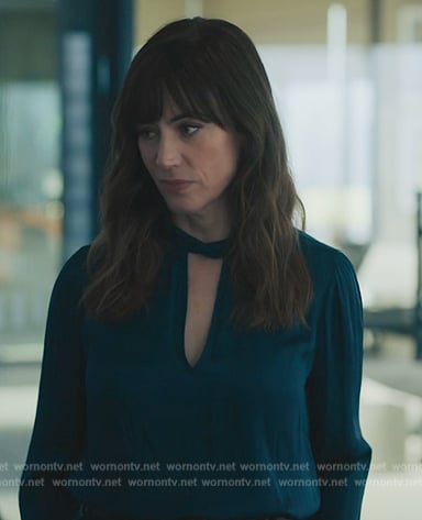 Wendy’s teal keyhole blouse on Billions